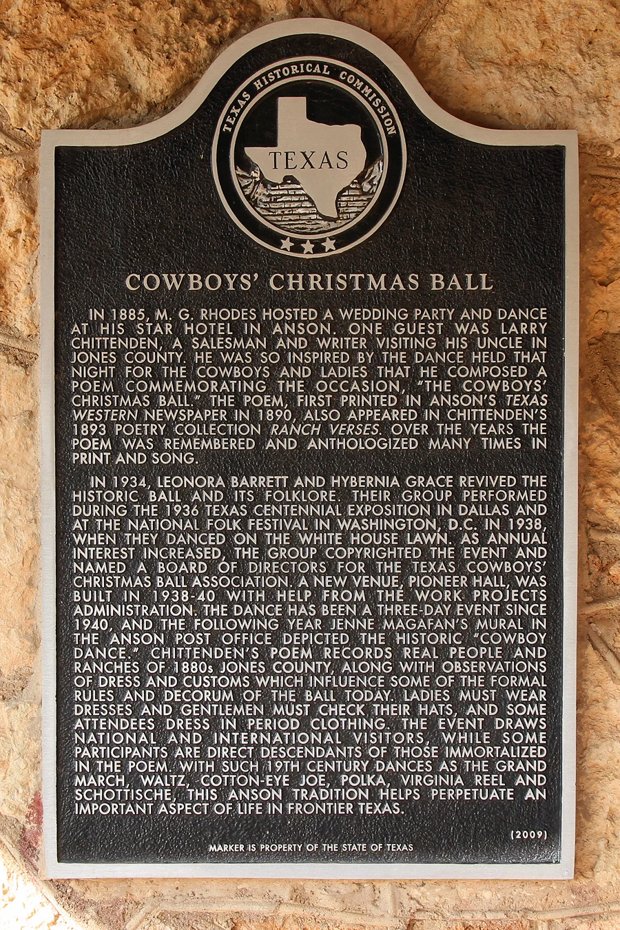 Cowboys' Christmas Ball historical marker on Pioneer Hall in Anson, Texas, United States.