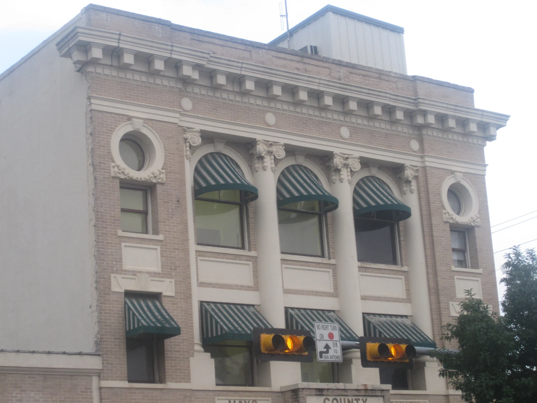 102 N. Lyndon B. Johnson Dr, San Marcos, Texas, United States is a contributing building to the Hays County Courthouse Historic District.