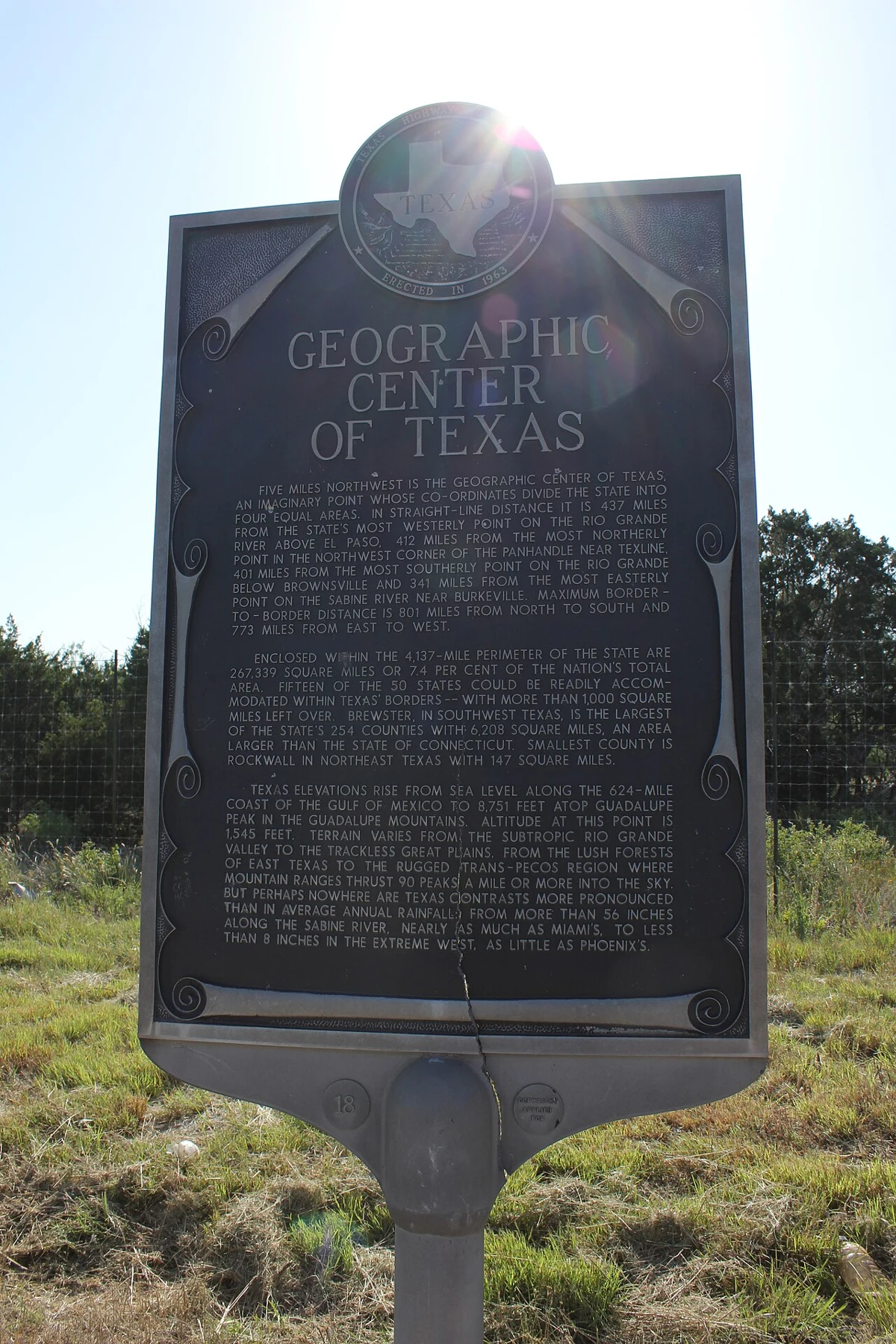 Five miles northwest is the geographic center of Texas, an imaginary point whose coordinates divide the state into four equal areas. In straight-line distance it is 437 miles from the state's most westerly point on the Rio Grande River above El Paso, 412 miles from the most northerly point in the northwest corner of the Panhandle near Texline, 401 miles from the most southerly point on the Rio Grande below Brownsville and 341 miles from the most easterly point on the Sabine River near Burkeville. Maximum border-to-border distance is 801 miles from north to south and 773 miles from east to west. Enclosed within the 4,137-mile perimeter of the state are 267,339 square miles or 7.4 per cent of the nation's total area. Fifteen of the 50 states could be readily accomodated within Texas' borders--with more than 1,000 square miles left over. Brewster, in southwest Texas, is the largest of the state's 254 counties with 6,208 square miles, an area larger than the state of Connecticut. Smallest county is Rockwall in northeast Texas with 147 square miles. Texas elevations rise from sea level along the 624-mile coast of the Gulf of Mexico to 8,751 feet atop Guadalupe Peak in the Guadalupe Mountains. Altitude at this point is 1,545 feet. Terrain varies from the subtropic Rio Grande Valley to the trackless Great Plains, from the lush forests of East Texas to the rugged Trans-Pecos region where mountain ranges thrust 90 peaks a mile or more into the sky. But perhaps nowhere are Texas contra
