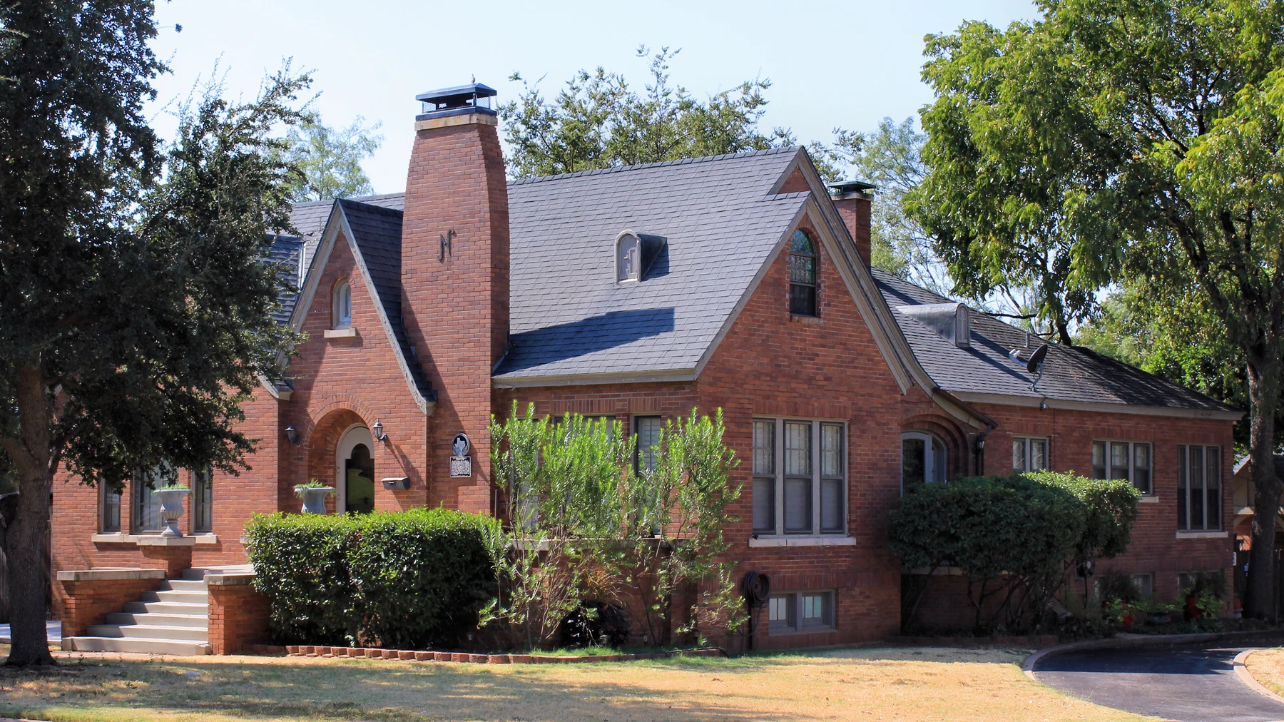 The I.M. (Mose) and Margaret Newman House in Sweetwater, Texas, United States. The Tudor Revival style house was built in 1925. The house was listed on the National Register of Historic Places on August 14, 2003 and designated a Recorded Texas Historic Landmark the same year.