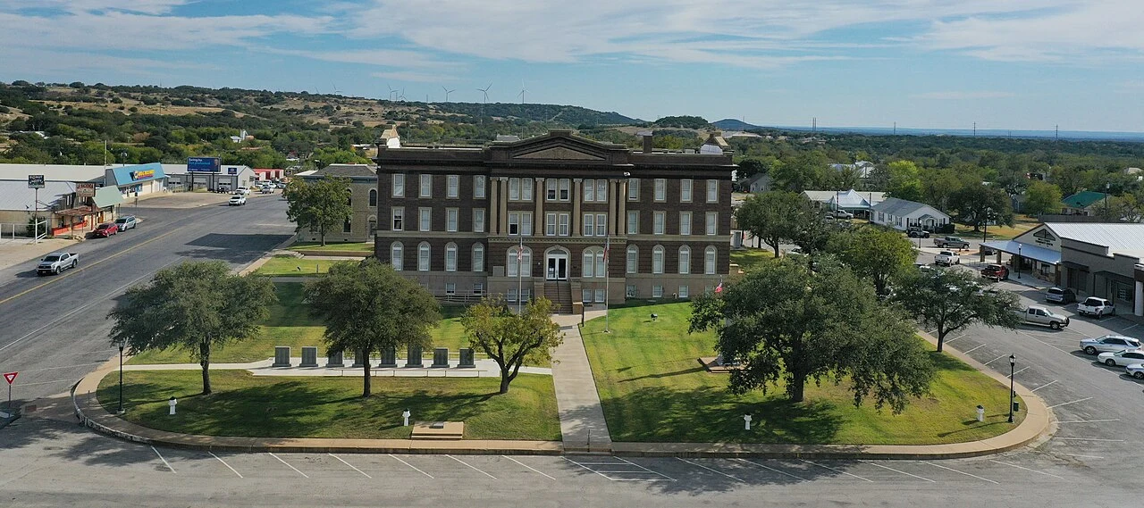 Drone photograph facing south, showing north side of Mills County Courthouse