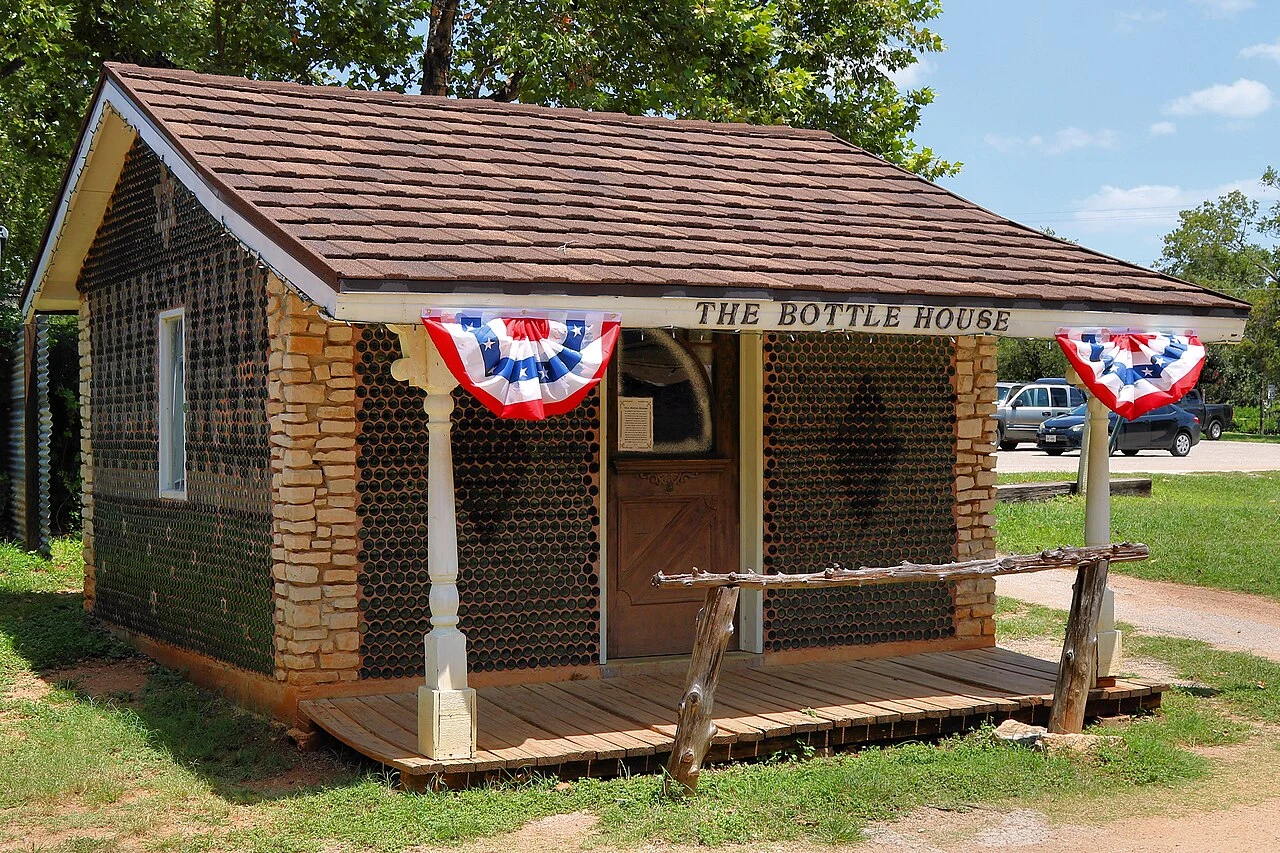 The Bottle House in Pioneer Town in Wimberley, Texas , United States is built of thousands of bottles.