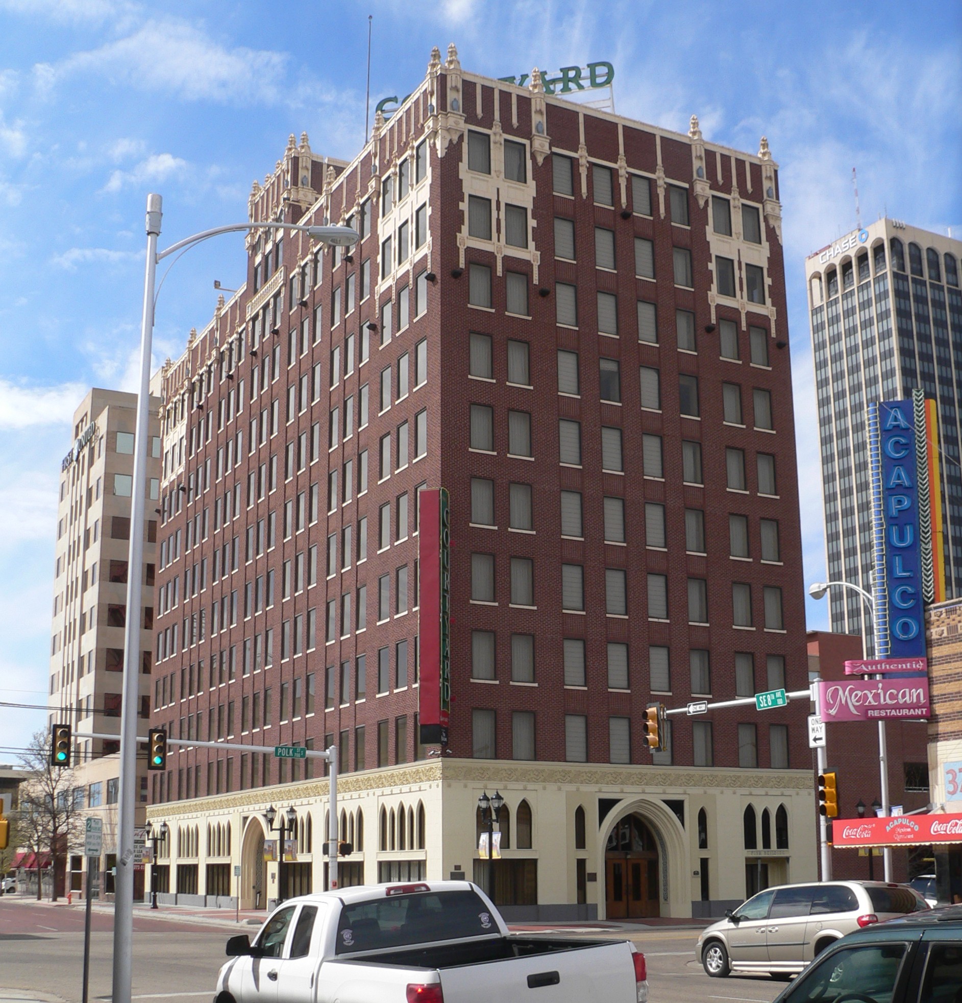 Marriott Courtyard Downtown Amarillo, formerly Fisk Building, at 724 S. Polk Street (northwest corner of 8th Avenue and Polk Street) in Amarillo, Texas; seen from the southeast, looking across the junction of 8th and Polk.