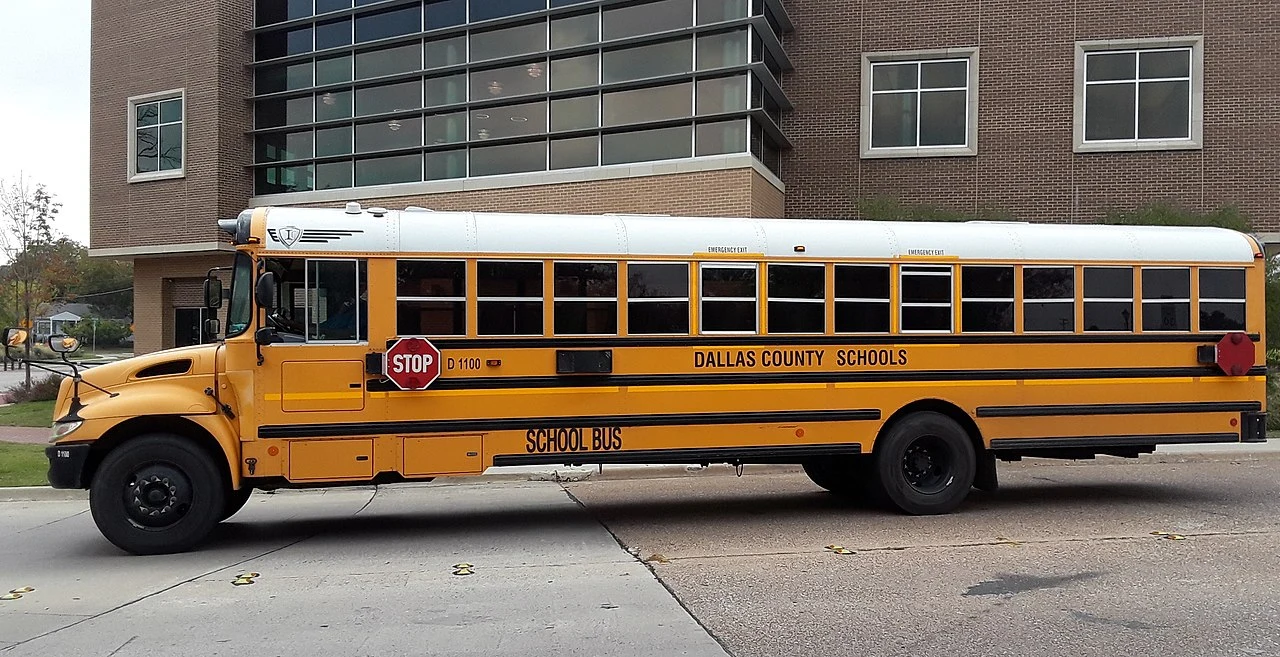 A school bus previously operated by Dallas County Schools prior to dissolution.