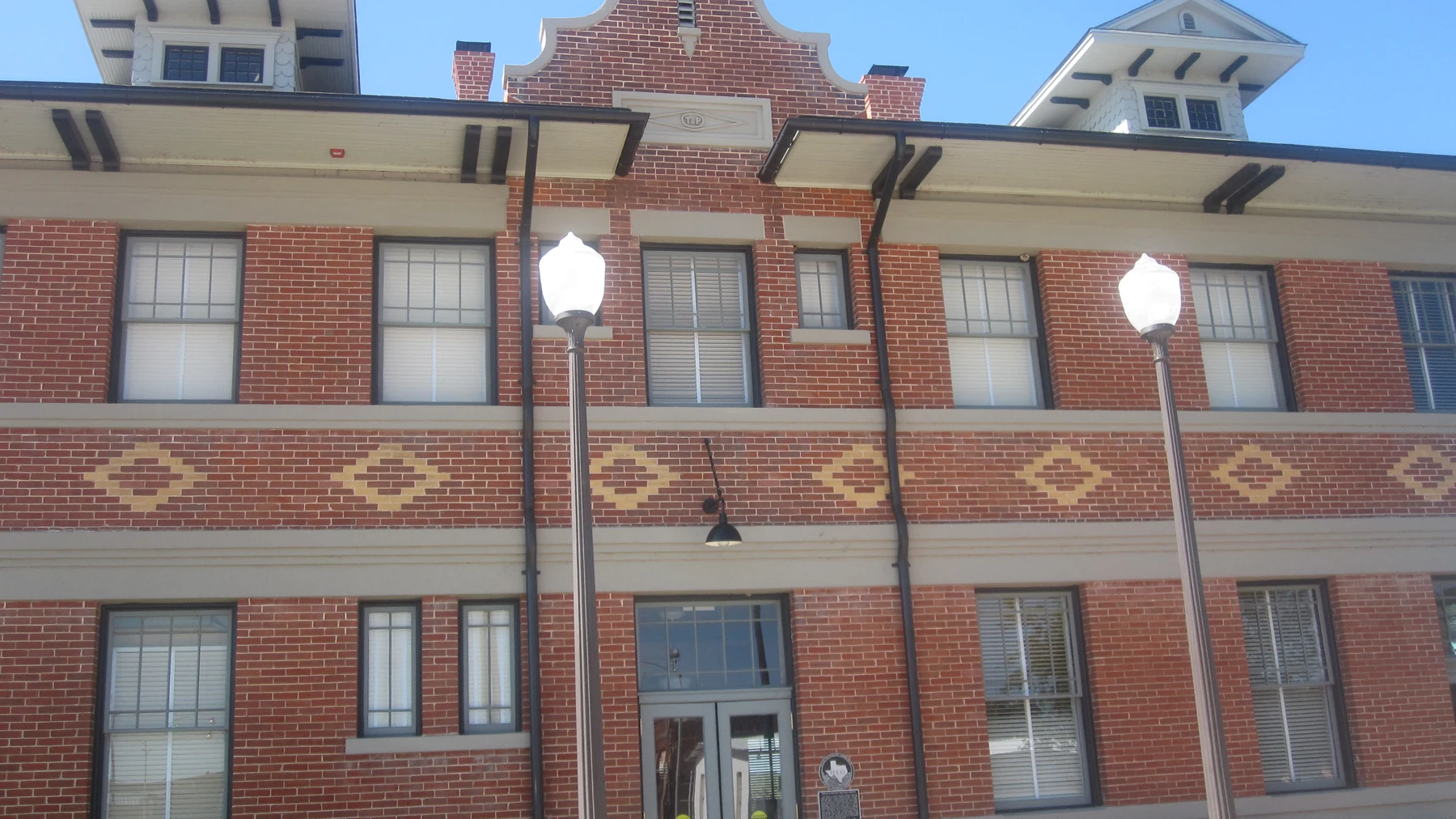 The Texas and Pacific Railway built this Prairie style train station in Baird in 1911. It was designated a Recorded Texas Historic Landmark in 1985. The former depot now serves as The T&P Depot Visitor Center and Transportation Museum. I took photo in Baird, TX, with Canon camera.