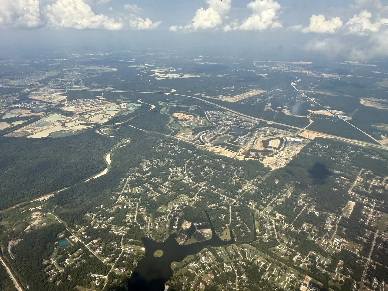 Aerial view northwestward centered on the northwestern portion of Porter, Montgomery County, Texas, seen from an airplane shortly after departure from George Bush Intercontinental Airport