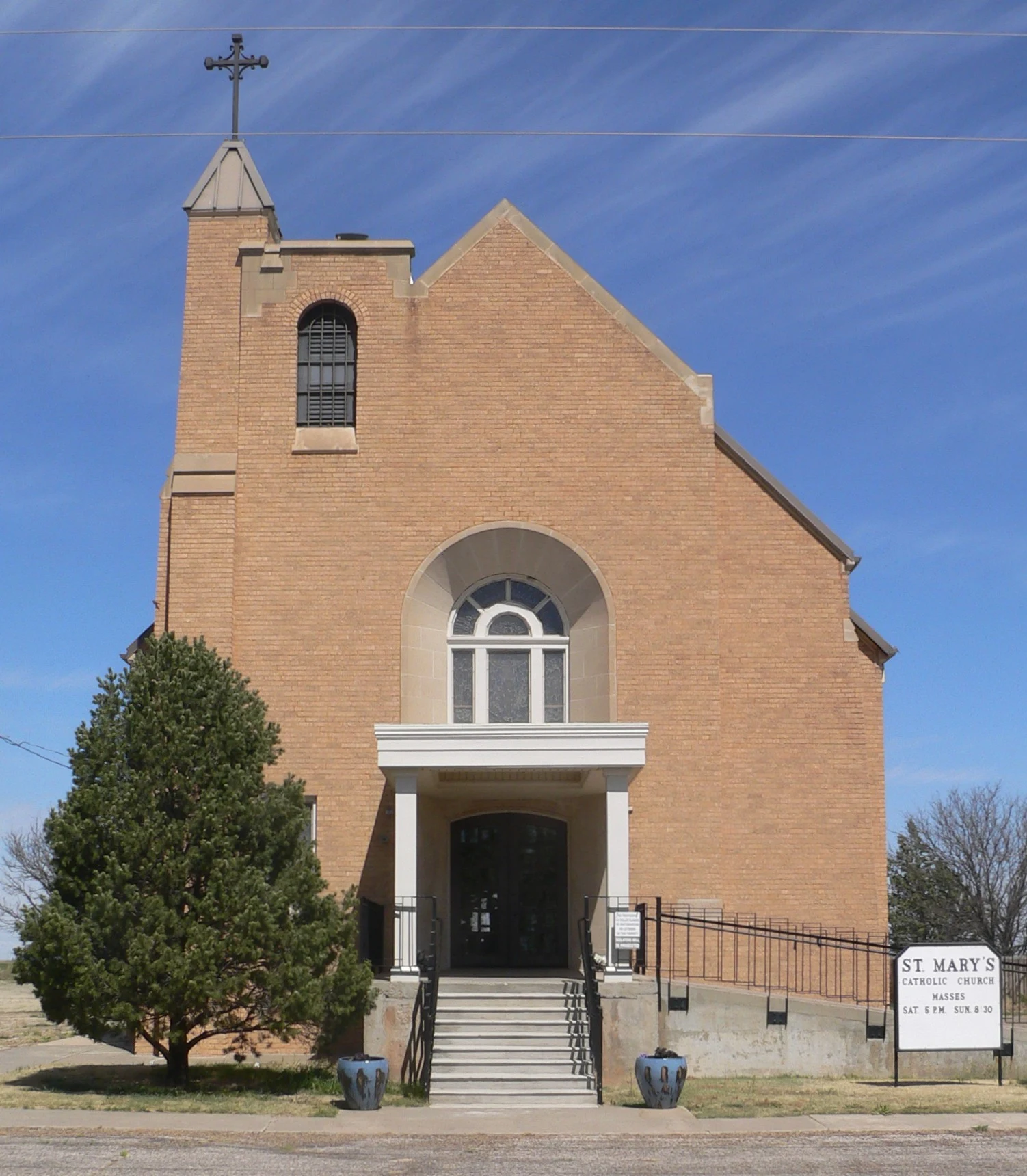 St. Mary's Catholic church, on the north side of Pondesetta Road in Umbarger, Texas; seen from the south.