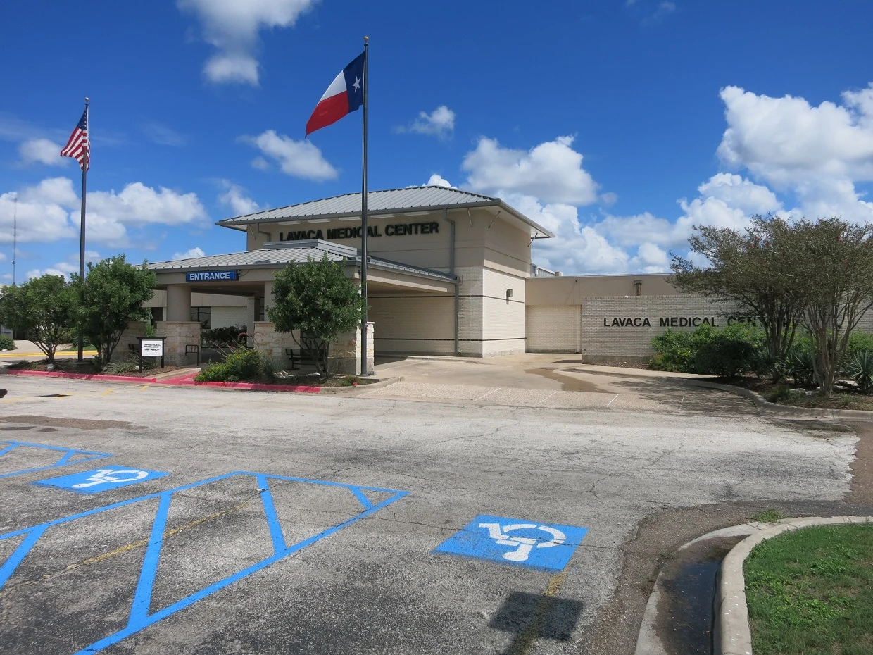 Photo shows the Lavaca Medical Center at 1400 N Texana Street, Hallettsville, TX 77964. View is toward the northeast.