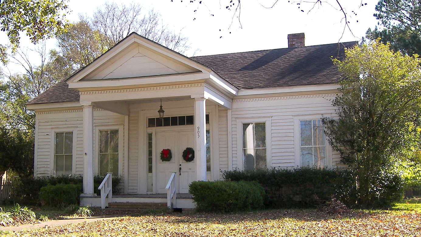 The Arnold-Simonton House in Montgomery, Texas, United States. Dr. E. J. Arnold, a prominent local physician, built this vernacular Greek Revival style house in 1845. The house was listed on the National Register of Historic Places on December 11, 1979. The house was moved from this location to the Fernland Historical Park in Montgomery after I took this photo.