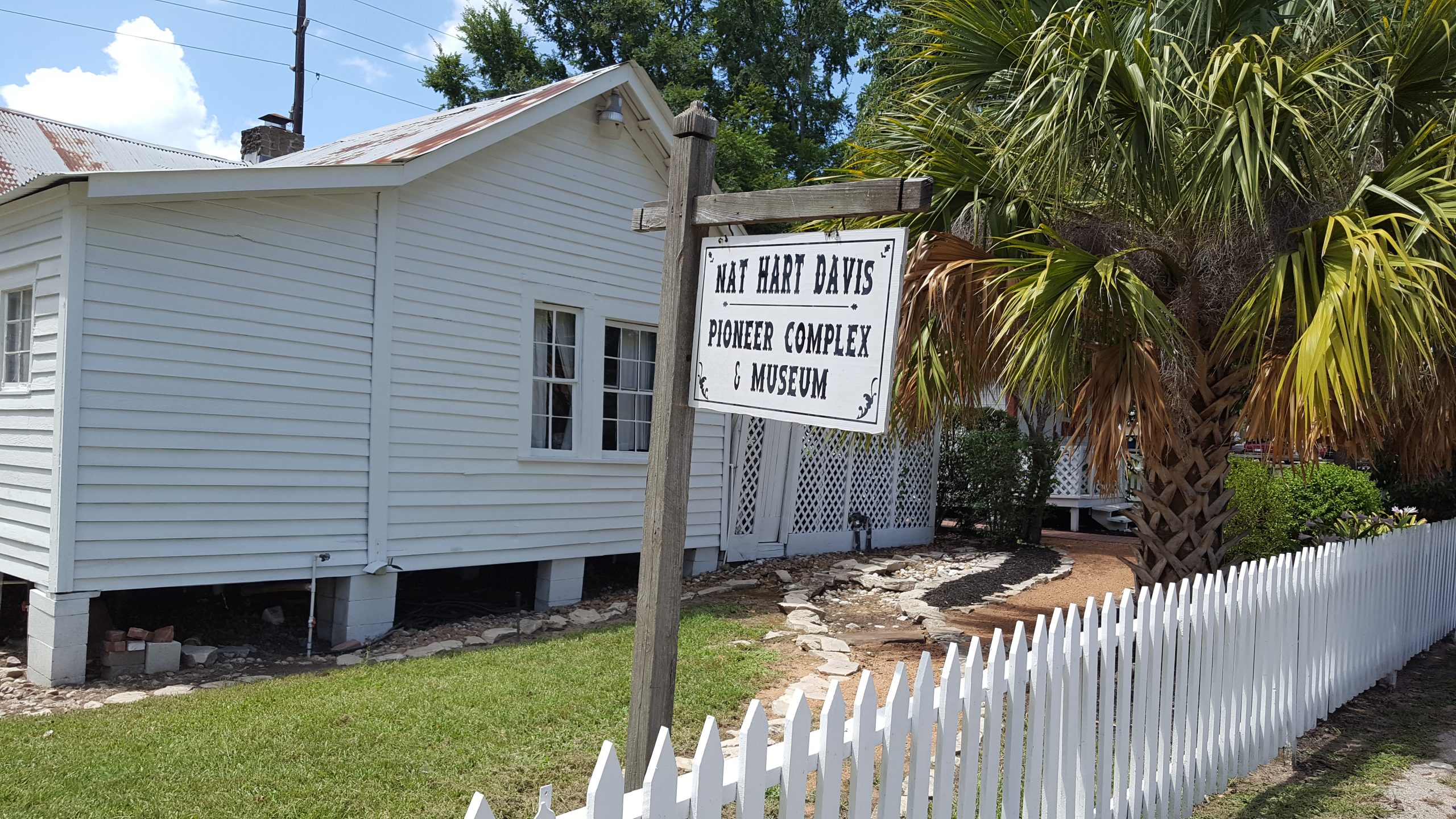 Home of Judge Nat Hart Davis and wife Sarah E. White. Built 1851, from an 1831 log house received as a legal fee. Registered with the State Historical Survey Committee. Now contains a historical museum.
