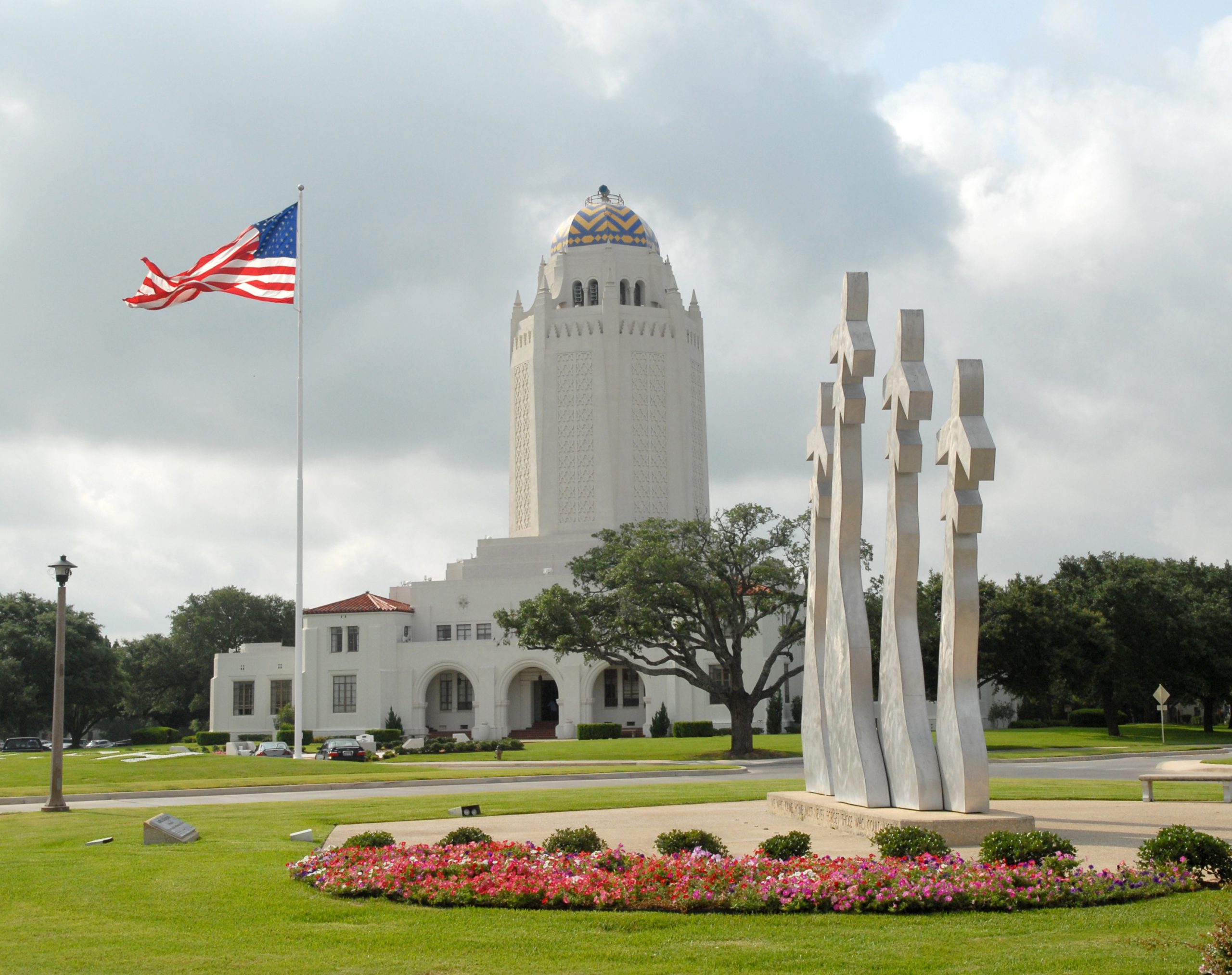 The 12th Flying Training Wing Headquarters (better known as "The Taj") at Randolph Air Force Base U.S.A., and the missing man monument in the morning sun.