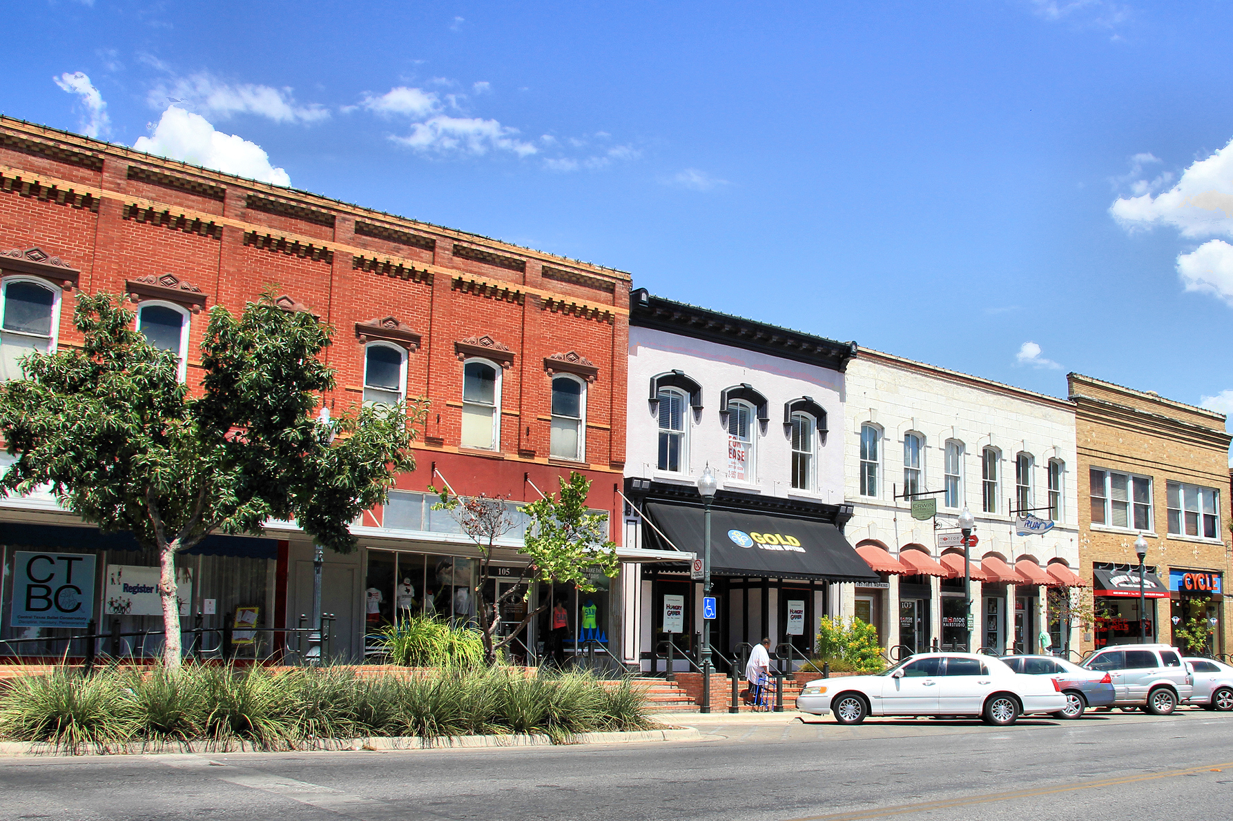 The 100 block of East Hopkins Street are contributing properties to the Hays County Courthouse Historic District in San Marcos, Texas , United States. The district was listed on the National Register of Historic Places on September 10, 1992.