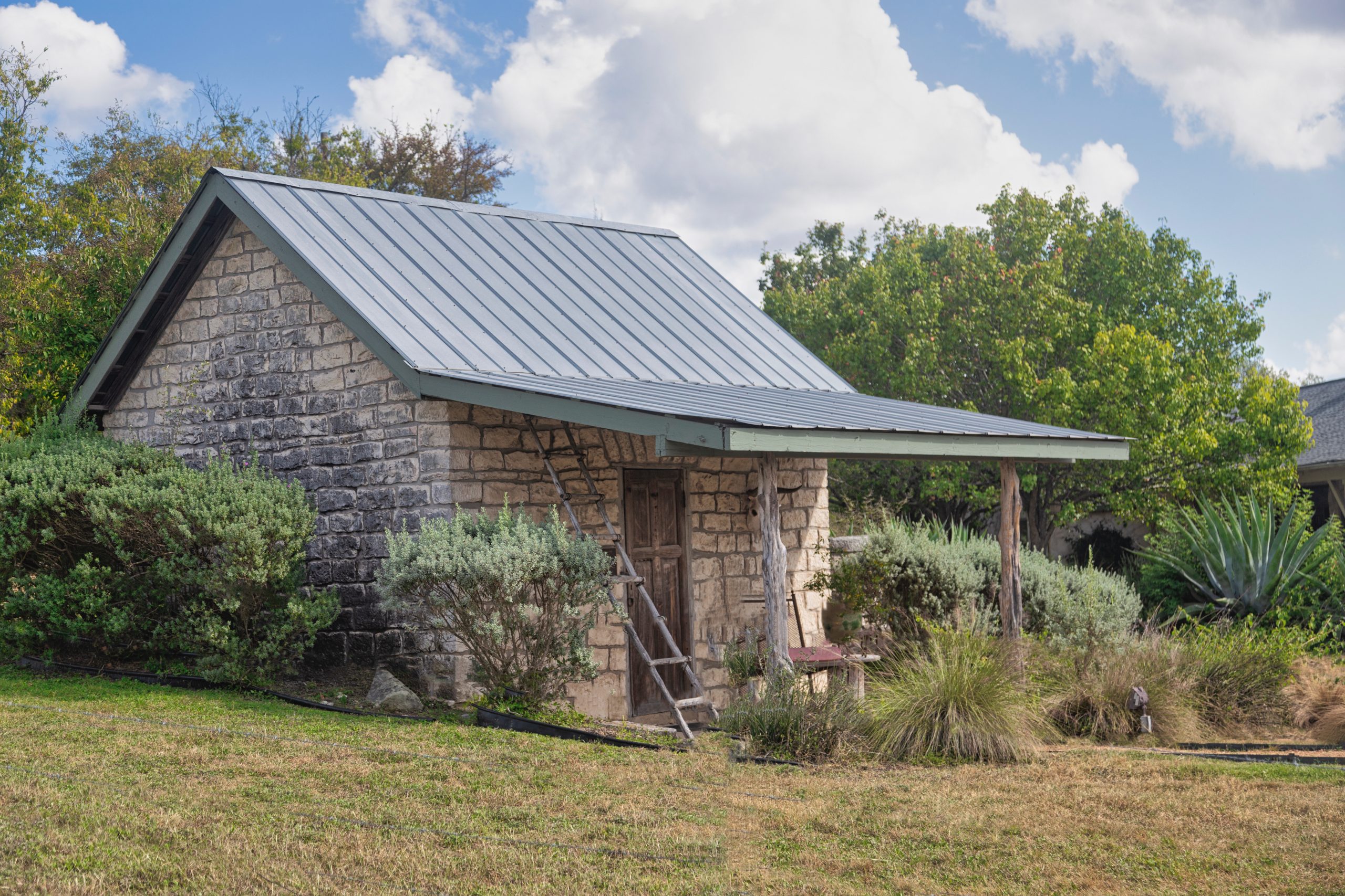 Front view of the "creamery" building at the Isham Jones Good homestead in northern Hays County, Texas. Building dates from the 1850's. It likely served as the first dwelling on the property. Good was a soldier in the 1836 Texas revolution, later the first sheriff of Caldwell County, settled in this area in 1851. More info at https://atlas.thc.texas.gov/NR/pdfs/04000896/04000896.pdf .